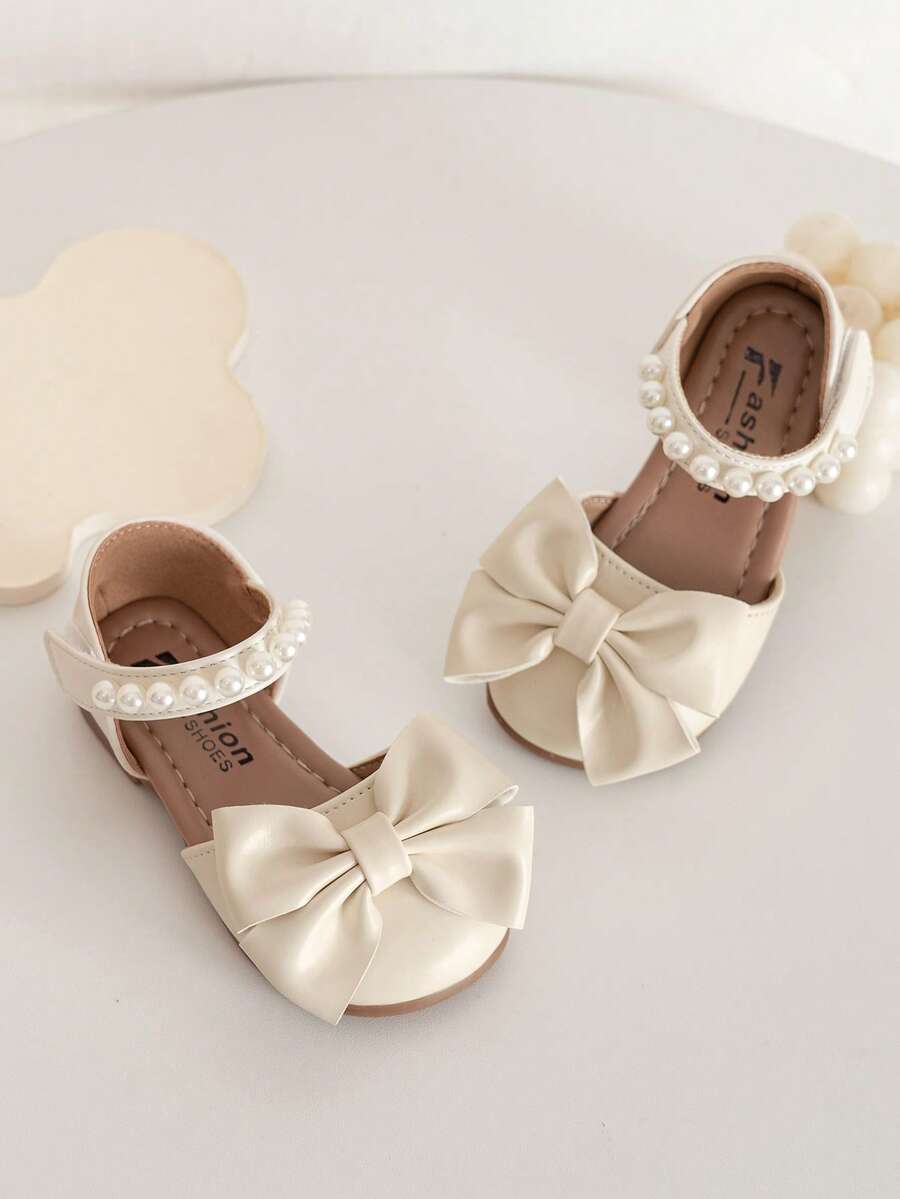 女童珍珠蝴蝶结凉鞋，夏季软底包头鞋，儿童公主风真皮鞋 - 白色 - 查看 1