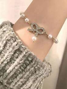 1件优雅女士简约仿珍珠猫爪手链，是新娘佩戴和情人节配饰的理想之选