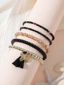 1 Set de Pulsera elástica de cuentas de cristal con borlas de diseño minimalista - Borla de mariposa - Ver 1