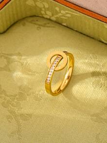 1枚18K镀金不锈钢极简镂空无限循环结缠绕戒指，时尚百搭，适合女性日常佩戴，可作为送给女友、妻子的礼物。 - 金戒指 - 查看 4