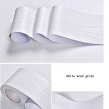 1条15厘米×5米自粘木纹修补胶带，适用于门框边缘、木门、踢脚板，可覆盖破损处并装饰墙面，可移除并重复使用于窗台、桌子、橱柜、衣柜等。 - 彩色 - 查看 5