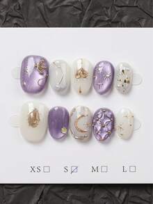 10颗手工椭圆形亮片，饰以迷人的月亮和星星图案，神秘而奢华。白色和米色调，点缀金色和银色，轻松搭配任何服饰，打造光彩照人的造型。美甲用品 - 紫羅蘭色 - 查看 2