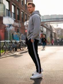 Pants deportivos para hombre, Colección Active Stripe - Negro - Ver 3