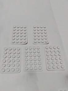 قطعة واحدة حامل هاتف سيليكون متعدد الاستخدامات مربع الشكل ب- 24 فتحة، مع إلصاق قوي مناسب لسيناريوهات متعددة، يمنع سقوط الهاتف