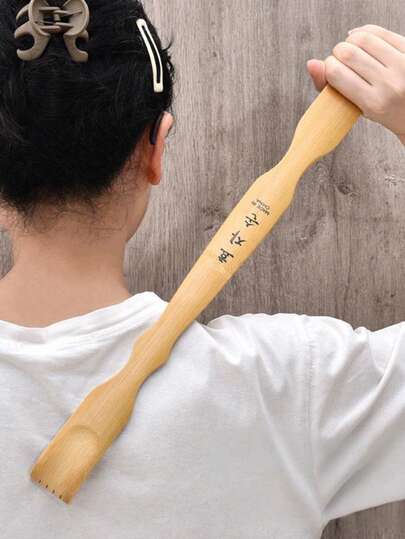 1个竹制止痒按摩器，适合老年人，可用于腰部及周围皮肤按摩，缓解瘙痒。背部挠痒按摩器，无需研磨，兰花茎挠痒耙。