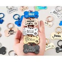 Customized Cute Bone-Shaped Stainless Steel Pet Tag. This Durable And Personalized Stainless Steel Pet ID Tag With A Charming Bone Design Can Create A Unique Mark For Your Beloved Pet. Whether As A Dog Name Tag Or Collar Decoration, It Can Showcase Your Pet's Distinctive Style. - Multicolor - View 5