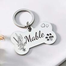Customized Cute Bone-Shaped Stainless Steel Pet Tag. This Personalized Stainless Steel Pet ID Tag With A Charming Bone Design Can Create A Unique Mark For Your Beloved Pet. Whether As A Dog Name Tag Or Collar Decoration, It Can Showcase Your Distinctive Style. Available In Multiple Colors To Meet Your Personalization Needs. - Multicolor - View 6