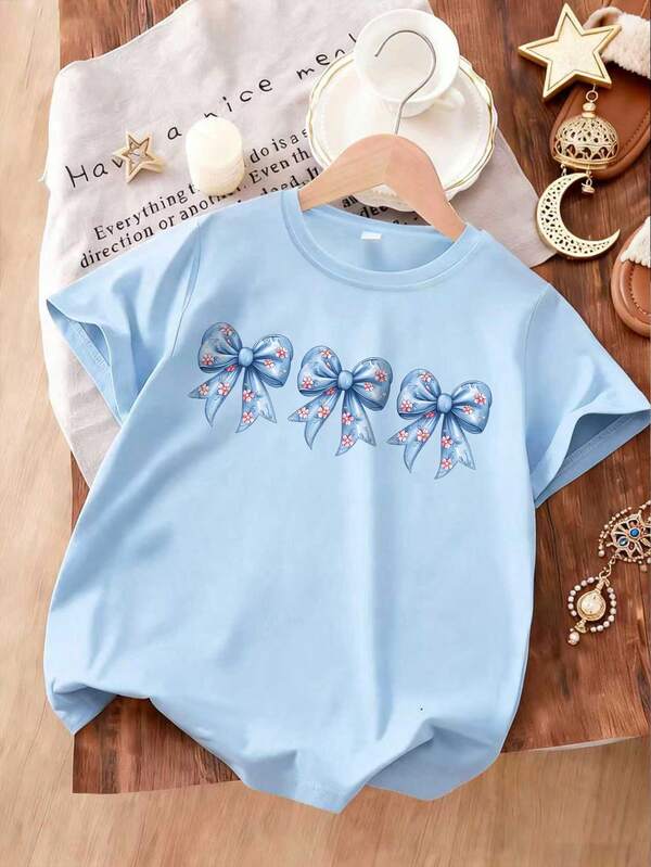 Camiseta de manga corta con cuello redondo y estampado floral para niñas, casual y versátil, adecuada para estudiantes jóvenes, minimalista y de moda, artículo esencial para primavera/verano