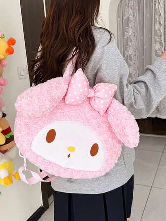  Sanrio En söt Sanrio Melody Cinnamon Dog-ryggsäck/axelväska för barn, en tecknad plyschväska med ett stort huvud och en cool Loomi-ryggsäck.