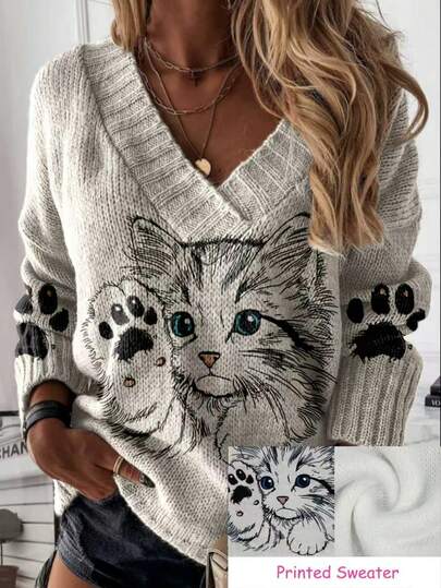 Suéter de punto con escote en V con estampado de pata de gato, holgado y casual de manga larga, moda de talla grande para mujer, ropa de invierno de talla grande para mujer en color blanco