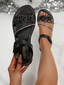 Sandalias planas de mujer con tira de , casual, con strass y lentejuelas, puntera redonda, unicolor, abierta, tipo slip-on, para playa, primavera/verano - Negro - Ver 1