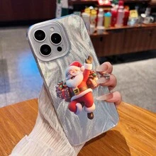 Un alegre Papá Noel saluda con alegría con sus regalos. Esta elegante funda es compatible con los modelos  16, 15, 14 Pro Max, 13, 12, 11, XR y XS Plus. Fabricada en silicona TPU, ofrece protección contra golpes y caídas, además de una sensación superior. Es un regalo ideal para familiares, amigos y seres queridos, y una opción perfecta para Navidad. - transparente - Ver 2