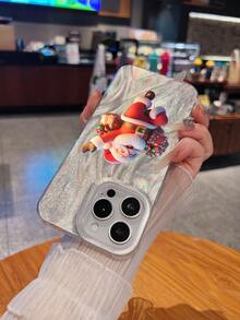 Un alegre Papá Noel saluda con alegría con sus regalos. Esta elegante funda es compatible con los modelos  16, 15, 14 Pro Max, 13, 12, 11, XR y XS Plus. Fabricada en silicona TPU, ofrece protección contra golpes y caídas, además de una sensación superior. Es un regalo ideal para familiares, amigos y seres queridos, y una opción perfecta para Navidad. - transparente - Ver 6