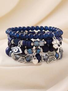 Bộ 4 vòng tay hạt thủy tinh phong cách Bohemian quyến rũ với hình mắt, cỏ bốn lá, trái tim, bướm, và hạt bồ đề, thích hợp cho nữ giới đeo hàng ngày, đi biển và du lịch. - Mắt, cỏ bốn lá, bướm - Xem 14