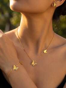 Bộ 4 món sang trọng, thời trang bằng thép không gỉ hình bướm vàng, gồm dây chuyền, vòng tay và bông tai, phù hợp cho nữ giới đeo hàng ngày, đa năng, thích hợp cho tiệc tùng, ngày lễ, hẹn hò, Giáng sinh, Ngày Valentine, Năm mới, cũng có thể dùng làm quà sinh nhật. - Vàng - Xem 2