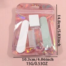 This 5-Piece Nail File Set Includes A Nail File, A Nail Cleaning Brush, And A Sponge Block. It Comes In Pink Holographic Packaging And Features A Sophisticated, Minimalist Design.