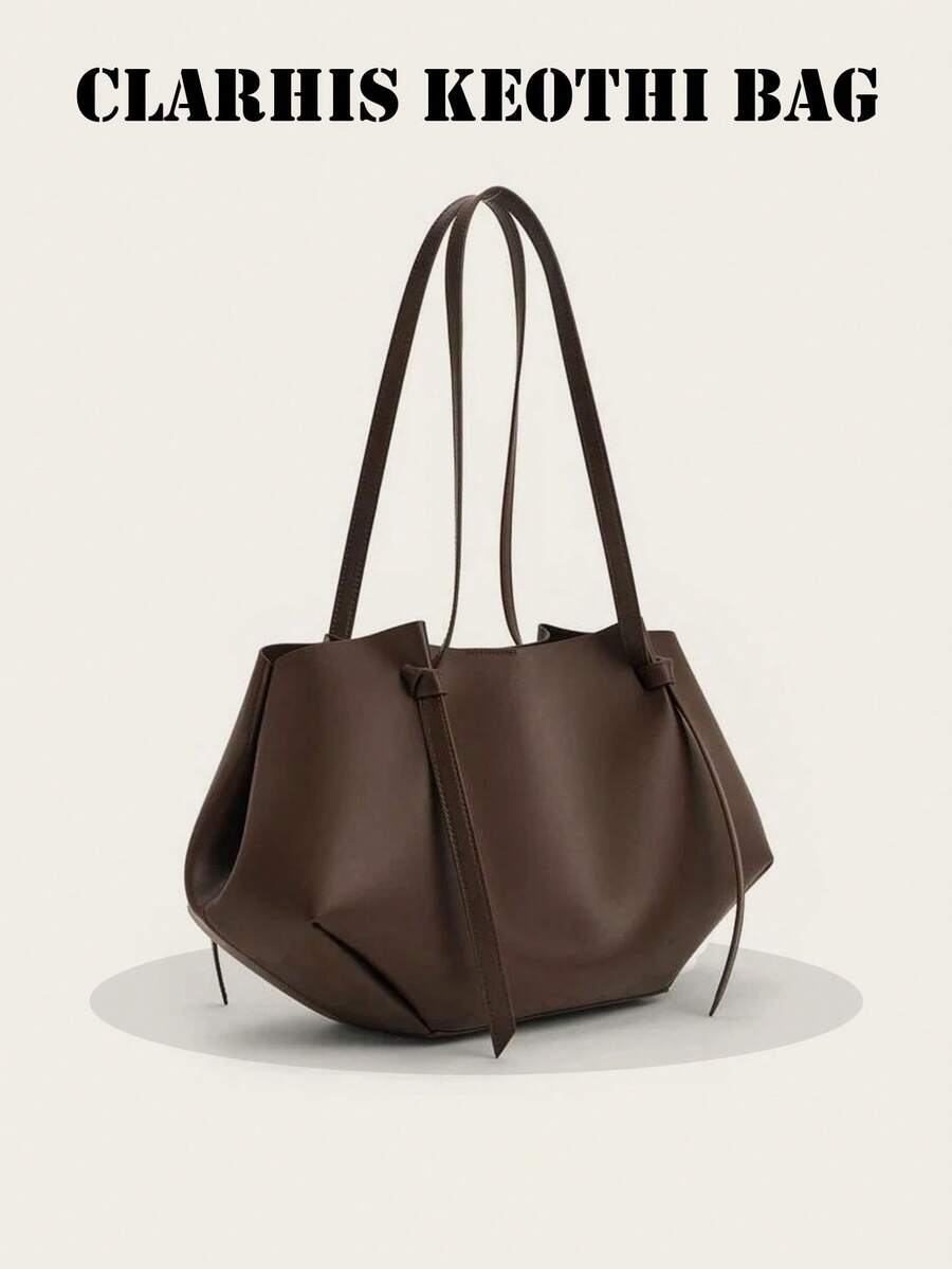 这款人气小众真皮女士包采用柔软褶皱设计，肩背，大容量，适合通勤、母子出行、手提，深棕色纯色PU材质，顶部强力磁扣，双提手，侧边按扣可调节包型，信封式设计方便收纳整理。 - 咖啡 - 查看 1