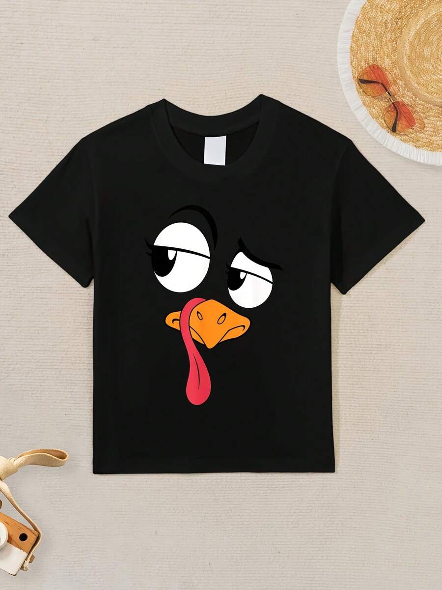 Funny thanksgiving graphics t-shirt - lindo pavo con ojos expresivos y diseño de swing retorcido,Camisetas para niños y niñas,Divertido exquisito diseño estampado top para niños y niñas, cómodo, ligero, transpirable, transpirable, adecuado para actividades al aire libre - regalo perfecto,Streetwear de moda, camiseta de manga corta de cuello redondo de 170g, apta para niños y adolescentes de 4 a 16 años. Camiseta de algodón 100% puro de alta calidad, lavable a máquina - Negro - Ver 1