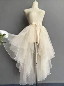 Đầm nữ 1 mảnh với vạt không đều, có các màu trắng, đen, đỏ, hồng, xanh nhạt, màu sâm panh, kiểu dáng bất đối xứng phía trước ngắn phía sau dài đuôi én, kiểu đuôi cá không đều, váy voan nhiều lớp, đầm biểu diễn thướt tha, váy maxi lưới Thụy Sĩ 3-6 lớp, kiểu tạp dề liền thân, váy xếp ly phủ ngoài, thích hợp cho đám cưới, tiệc chiêu đãi, biểu diễn, liên hoan, cô dâu, phù dâu, biểu diễn sân khấu, cosplay, đạo cụ chụp ảnh du lịch, buổi biểu diễn khiêu vũ, trang phục Halloween. - Nhiều màu - Xem 13