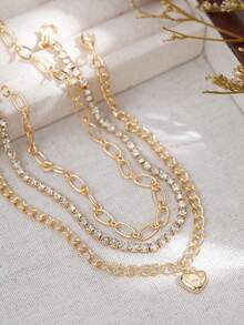 Nooxian 3件套脚链：金色链条配小吊坠 + 多层简约休闲金色链条，层叠闪亮锆石心形吊坠，多层脚链首饰，女士礼物（链条环数量随机） - 金黃色 - 查看 6