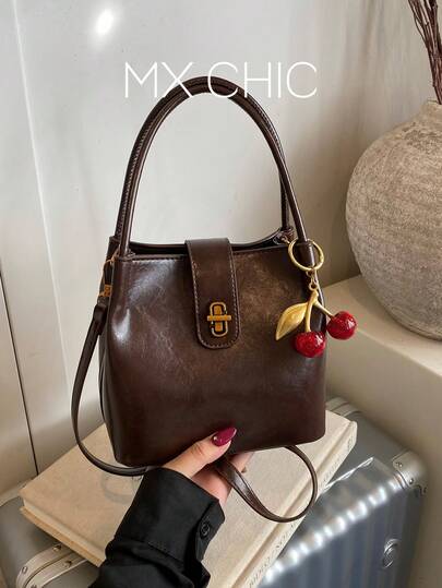 1pc Women's Solid Color Bucket Bag, Fashionable Retro PU Twist Lock Handbag With Cherry Pendant, Suitable For Commuting, Shopping, And Gift