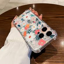 Estampado floral con colores vibrantes y fondo blanco. Esta elegante funda es compatible con los modelos  16, 15, 14 Pro Max, 13, 12, 11, XR y XS Plus. Fabricada en silicona TPU, ofrece protección contra golpes y caídas, además de una sensación superior. Es un regalo ideal para familiares, amigos y seres queridos, y una opción perfecta para Navidad. - transparente - Ver 4