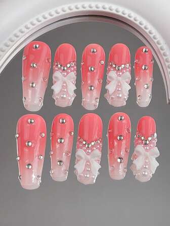 10 st. kistformade romantiska nagelklistermärken, eleganta vita pärlor och 3D-rosett strassutsmyckningar i en tonad röd, heltäckande design, lämplig för kvinnor och flickor. Nagelklistermärken för vardagliga kontoret. Nageltillbehör för alla hjärtans dag. Glittrande nagelkonst för alla hjärtans dag, lämplig för fester, dans och vardagsbruk, akryl press-on naglar, gör-det-själv nageltillbehör.