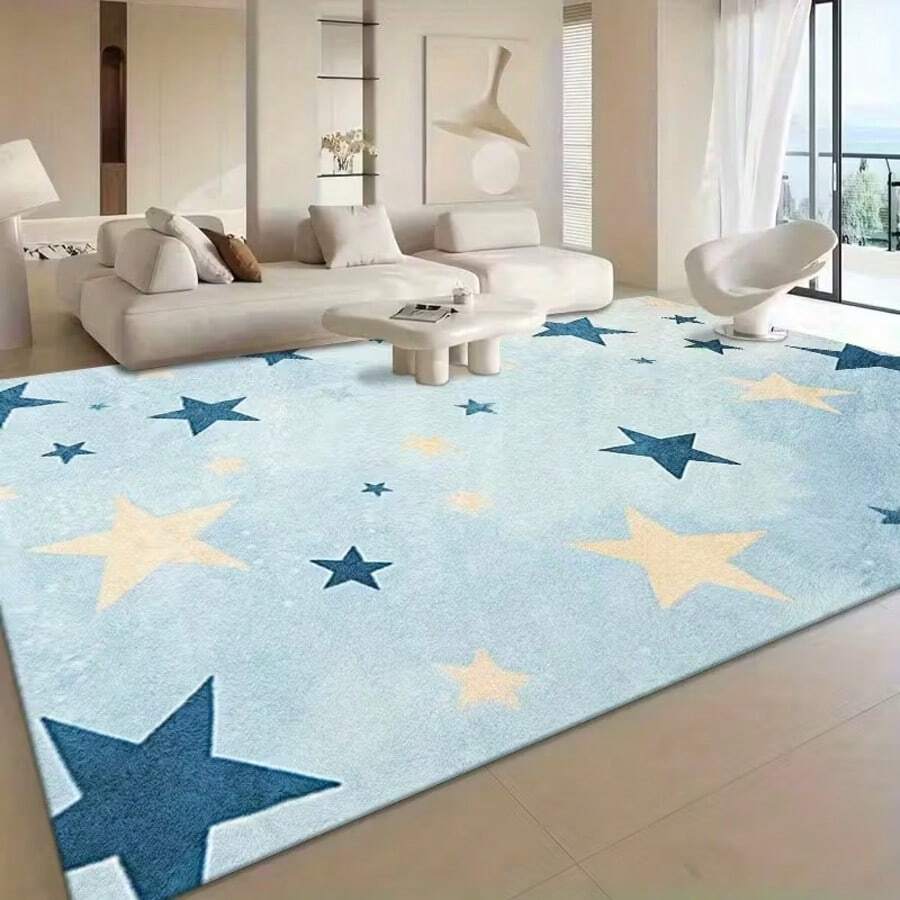 1 件柔软蓝色星形图案地毯，浅蓝色底色，饰以蓝黄相间的星星图案，清新治愈风格，适合现代简约或儿童房客厅或游戏区；易于清洁，可水洗。