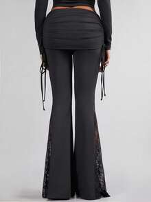 Trang phục nữ Xuân/Hè: Quần ống loe đen phong cách Gothic với họa tiết xương đính đá lấp lánh, điểm nhấn là các chi tiết ren bên hông, thiết kế xếp ly cạp thấp và dây buộc. Được làm từ chất liệu lụa băng mềm mại, thoải mái, phù hợp cho mặc hàng ngày, chụp ảnh đường phố, dự tiệc, đi biển, lễ hội âm nhạc và tạo phong cách cho ngày Valentine. - màu đen - Xem 3