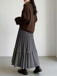 2025秋冬新款高腰A字伞裙，针织荷叶边装饰，梨形身材修身设计，休闲伞裙