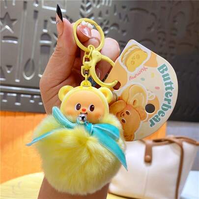 Llavero de la serie Butter Bear, bonito colgante de oso de mantequilla peludo, llavero de peluche suave rosa, accesorio para llaves con personaje de dibujos animados, abalorio de bolso de moda, decoración portátil para llaves de coche, regalo encantador para niñas, mujeres, amigas, regalo de vacaciones, pequeño adorno periférico IP.