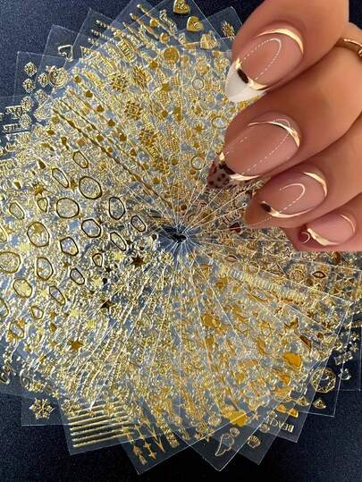 30张金色美甲贴纸，自粘式美甲贴花，图案包括不规则叶子/线条/星星/圆圈/心形/雪花/数字/箭头/几何图案，适合女士奢华美甲