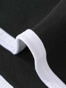 这款两件套包括一件休闲字母印花圆领短款T恤和一条休闲运动短裤，非常适合夏季穿着。它是购物、聚会、运动、旅行和上学的理想选择，也适合青少年男孩穿着。它既是一套运动服，也是一套儿童服装。 - 彩色 - 查看 8