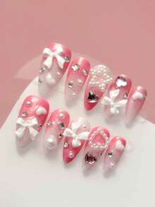 Bộ 10 móng giả dán thủ công, hình hạnh nhân cỡ trung bình, móng tay ngày Valentine, móng tay màu hồng lãng mạn, móng tay dễ thương, móng tay nơ trắng đính ngọc trai hình trái tim, móng tay ombre hồng, móng tay đính pha lê hình trái tim hồng, móng tay kiểu ballet, móng giả có thể tháo rời, móng tay hình hạnh nhân, móng giả dán tái sử dụng, dụng cụ làm móng, bộ dụng cụ làm móng, thích hợp cho tiệc tùng, khiêu vũ, sử dụng hàng ngày, tụ họp sinh viên, kèm theo gel dẻo và dũa móng, phụ kiện làm móng DIY. - Hồng - Xem 2