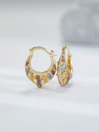A Pair Of Uniquely Designed, Bag Shaped, High-End Golden Circular Fortune Bag Earrings That Are Perfect For Everyday Wear By Women