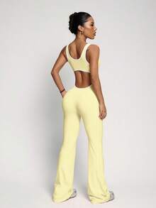 Diseño con recorte en el abdomen, silueta de pierna acampanada para alargar las piernas, #Ropa deportiva sexy #Confiada y juguetona #Lista para la cámara, Mono sin espalda, Mono con cintura ceñida, Leggings de pierna acampanada, Ropa deportiva que levanta el trasero, Mono de yoga con cintura ceñida y levantamiento de glúteos - Amarillo claro - Ver 5
