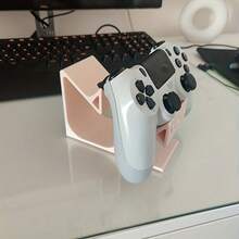 1个双游戏手柄支架，耐用塑料材质，节省空间设计，适用于PlayStation 5手柄和耳机，简约黑白配色，高品质塑料，游戏配件，紧凑设计，结构坚固，家庭娱乐视频游戏 > PlayStation 4支架套装 视频游戏 > PlayStation 4及配件 > - 彩色 - 查看 6