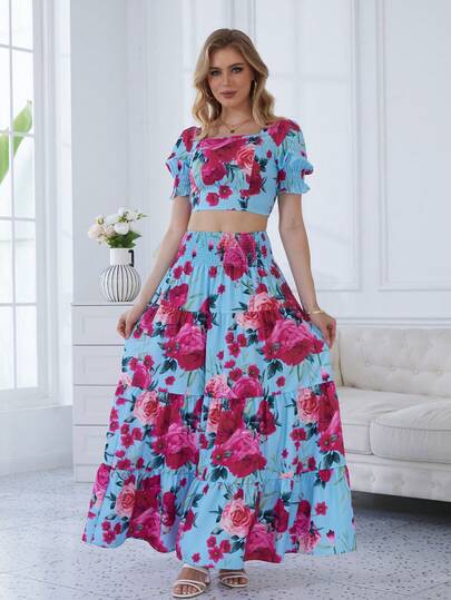 Astrid Bộ đồ hai mảnh phong cách boho hoa lá thanh lịch dành cho nữ, gồm áo crop top trễ vai xếp ly kết hợp với chân váy dài nhiều lớp, được làm từ chất liệu co giãn, thích hợp cho mùa hè.
