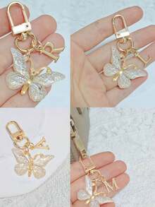 时尚创意渐变闪亮蝴蝶字母钥匙扣，A-Z字母款式，优雅独特，可挂在女士包包或车钥匙上。DIY手机和包包挂件，生日、节日、派对、乔迁、母亲节、教师节、复活节、情人节、朋友聚会、毕业季、返校季小礼物，送给朋友或家人的独特可爱礼物。 - 彩色 - 查看 7