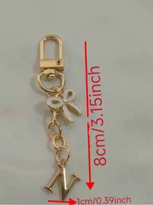 1个白色优雅蝴蝶结字母钥匙扣，大写字母A-Z钥匙圈吊坠，适用于包包、背包和车钥匙 - 彩色 - 查看 6