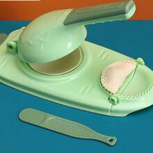 A Convenient Dumpling Maker - A Small Kitchen Tool That Helps Slouchy People Manually Roll Out Dumpling Wrappers. A Mold Designed Specifically For Rolling Out Dumpling Wrappers, An Essential Tool For Homemade Dumplings.