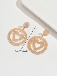 1 Đôi bông tai nữ hình trái tim rỗng bằng kim loại, thích hợp để đeo hàng ngày. - Vàng - Xem 4