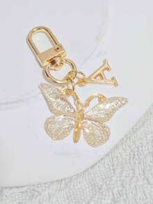 时尚创意渐变闪亮蝴蝶字母钥匙扣，A-Z字母款式，优雅独特，可挂在女士包包或车钥匙上。DIY手机和包包挂件，生日、节日、派对、乔迁、母亲节、教师节、复活节、情人节、朋友聚会、毕业季、返校季小礼物，送给朋友或家人的独特可爱礼物。 - 彩色 - 查看 9