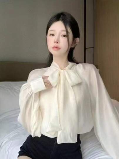 temperamento francés lazo de lazo camisa de manga larga de diseño femenino sentido nicho elegante blusa blusa primavera y otoño blusas elegantes dama