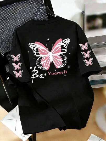大码女式蝴蝶图案短袖T恤 - 灰色底粉色滚边，“做你自己”印花，舒适套头衫，适合春夏穿着，可机洗，休闲百搭，适合日常穿着、外出、聚会、上学、音乐节、度假、通勤等场合。可作为礼物送给家人、男友、女友、朋友，是女孩夏季必备的短袖T恤。黑色