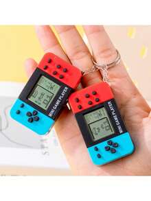 1个复古迷你黑白游戏机钥匙扣（含纽扣电池），迷你游戏机挂件，万圣节、圣诞节礼物，包包挂件玩具，吊坠，生日礼物，包包饰品，汽车配件，送给老师、朋友、姐妹的礼物创意