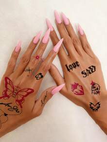 两张大尺寸人体彩绘临时纹身贴纸，男女皆宜，Y2K未来主义风格，图案包括链条、心形、火焰、蝴蝶、骷髅和吉他。防水假纹身，可持续2-5天，可贴于手指、手掌、手臂、颈部、胸部、腰部、腿部和脚踝。是派对、送礼、音乐节、摇滚音乐会和旅行的完美之选。 - 彩色 - 查看 6