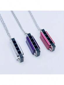 Mini Necklace Harmonica, Available In Multiple Colors. This Is An Entry-Level Musical Instrument, Belonging To The Harmonica, Musical Instrument, And Musical Instrument Series Categories.