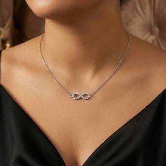 1 pieza Collar de Infinito con incrustaciones de circonita cúbica en tono dorado de lujo para mujer