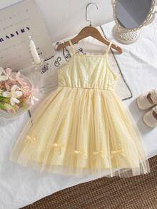 Girls' Casual Solid Color Sleeveless Knee-Length Dress With Bow Decor And Mesh Hem Design, Suitable For Spring/Summer - Yellow - View 1